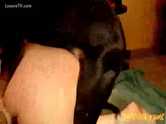 A fat bitch's puppy makes her happy